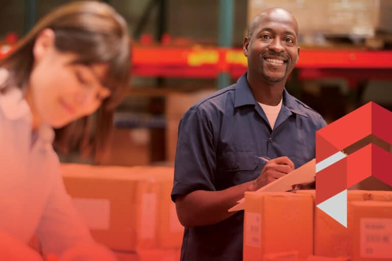 FIDELITONE inventory managers smiling and holding clipboards